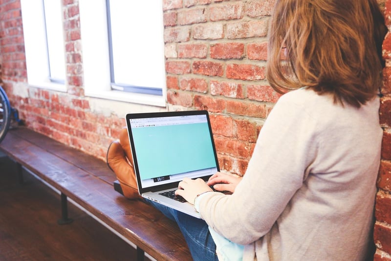Business Woman Climbing the Corporate Ladder